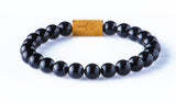 Black onyx 8 mm yellow gold