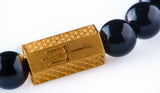 Black onyx 8 mm yellow gold